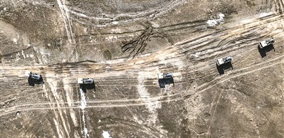 向預定地域機動。